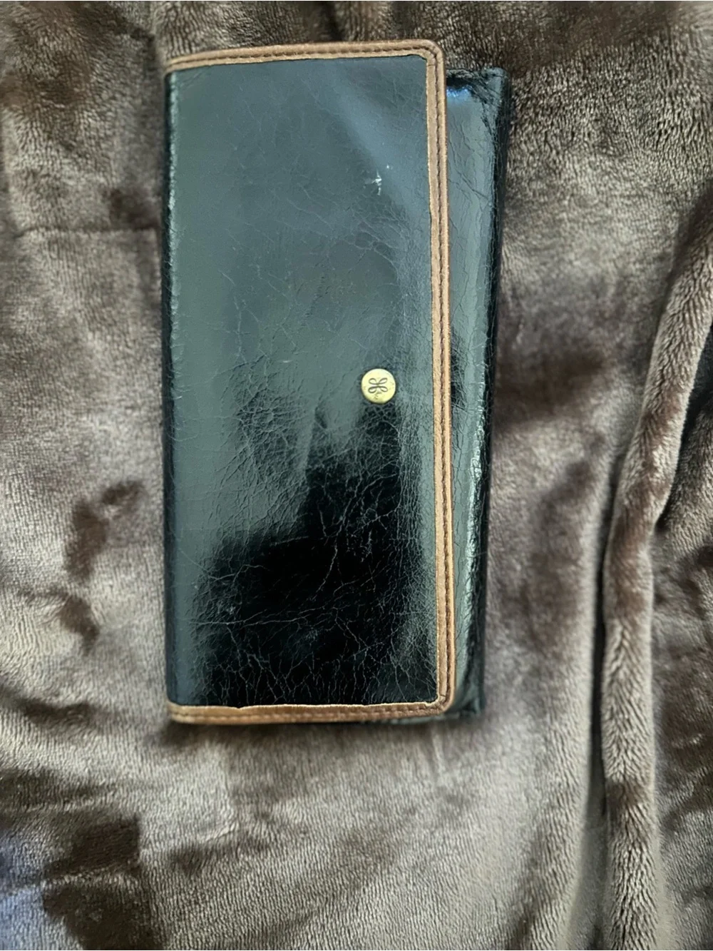 Black Leather Wallet with Brown Trim and Gold Logo